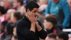 Arsenals Cautious Tactics Lead to Defeat Against Liverpool